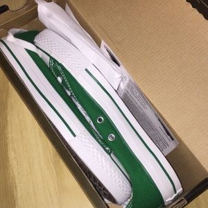 Green and white converse all stars